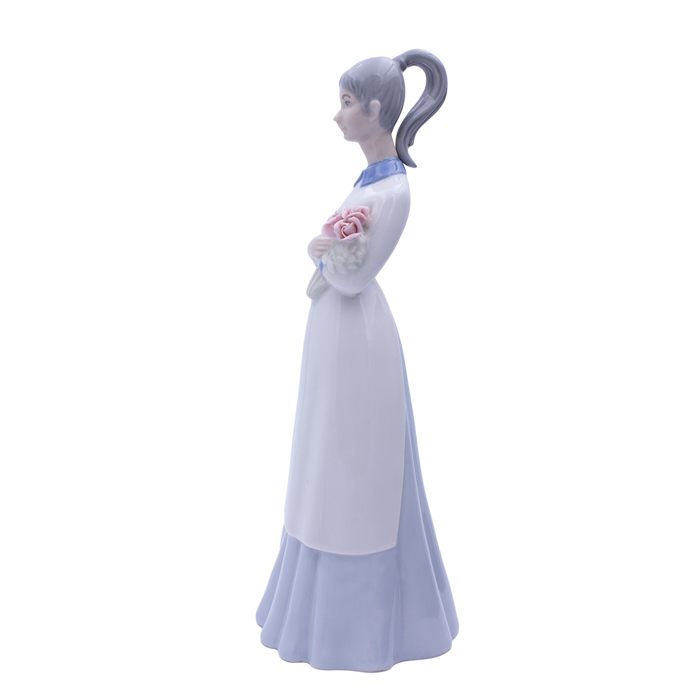 Springtime Serenity – Lladró-Style Porcelain Girl Holding Flowers