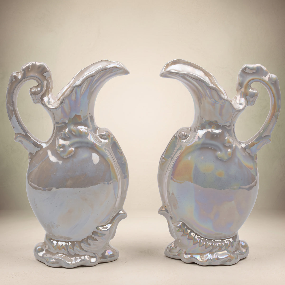 Pair of Iridescent White Ceramic Decorative Ewers - Scroll Handles