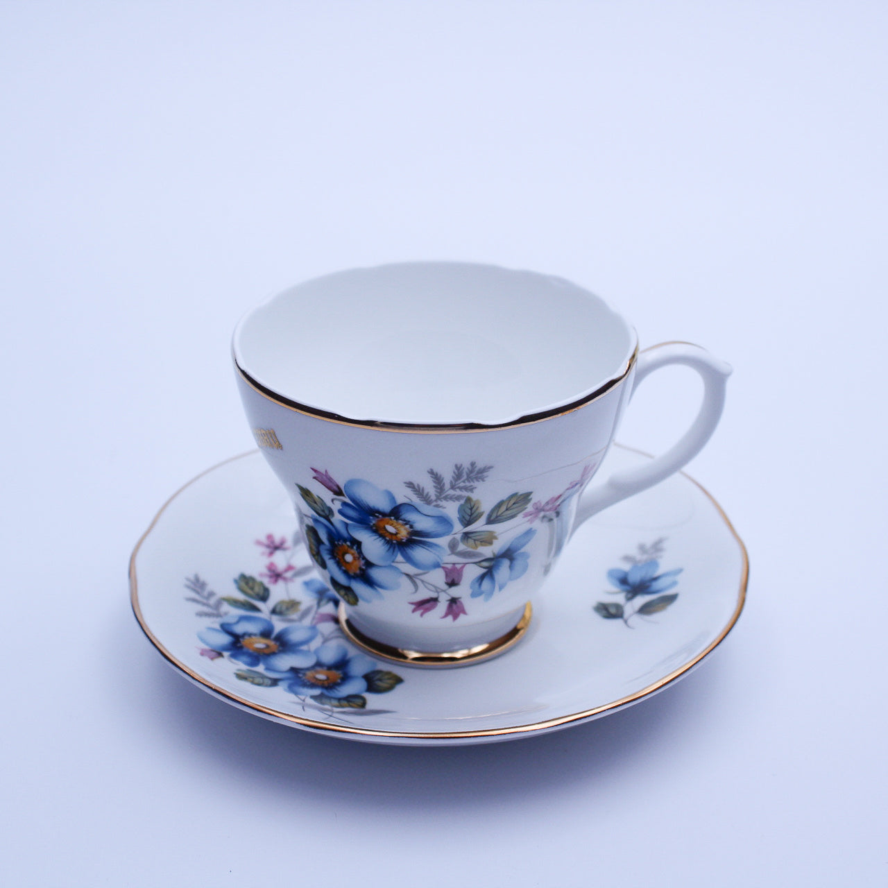 Liverpool Road Pottery Bone China Teacup & Saucer, Blue Floral, Gold Nassau, England