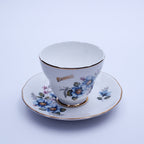 Liverpool Road Pottery Tasse und Untertasse aus Knochenporzellan, blau geblümt, Gold Nassau, England