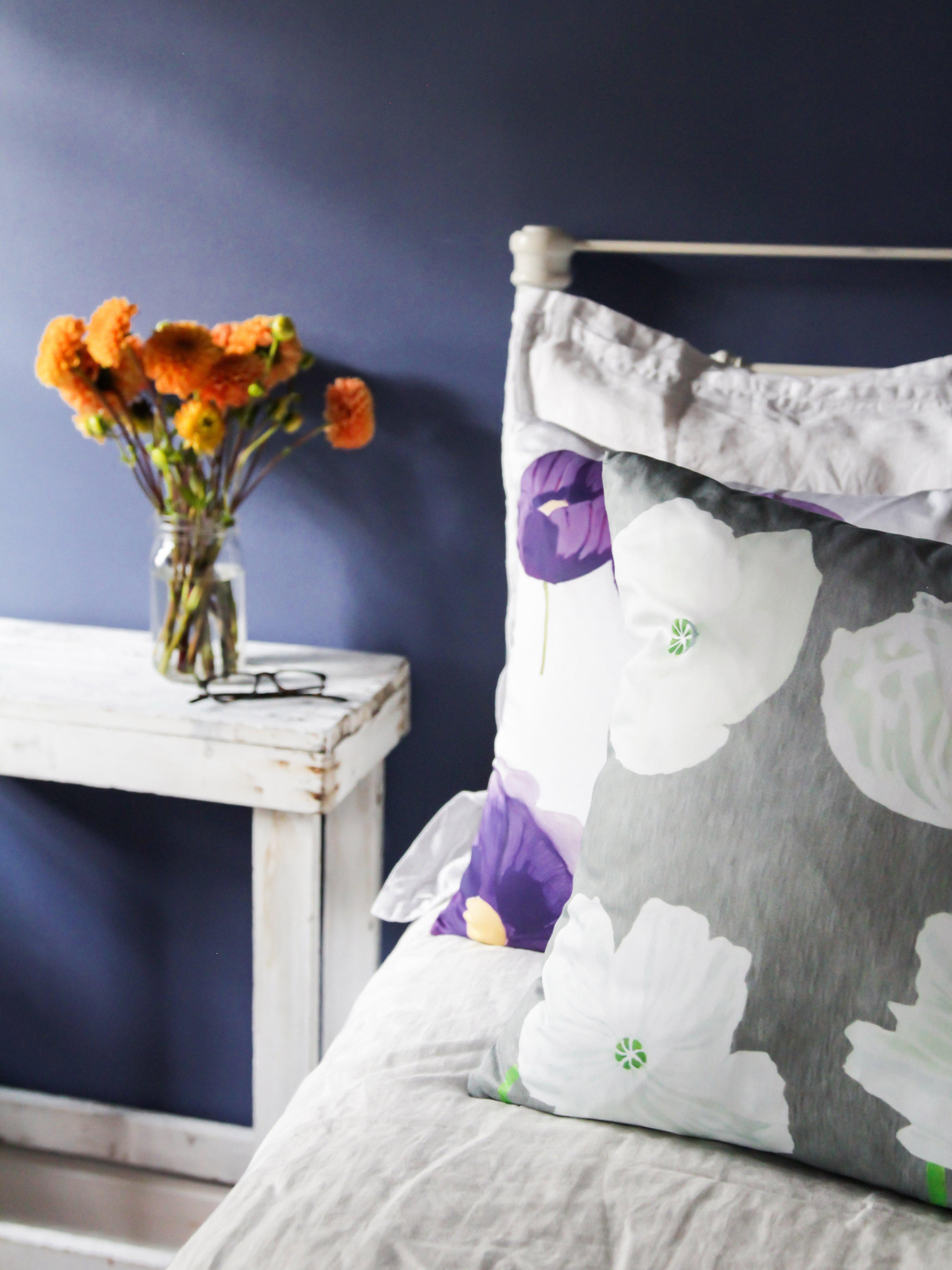 Throw Pillow: Purple Poppies on Snow